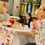 Graphic of a group of people seated around a table on the altar looking out towards the congregation.