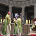Graphic of Archbishop Farrell with His Excellency Archbishop Jude Thaddeus Okolo, Apostolic Nuncio to Ireland speaking to each other at the altar.