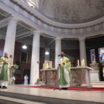 Graphic of archbishop Farrell and His Excellency Archbishop Jude Thaddeus Okolo, Apostolic Nuncio to Ireland standing at the altar for the Imposition of the Pallium on Archbishop Farrell.