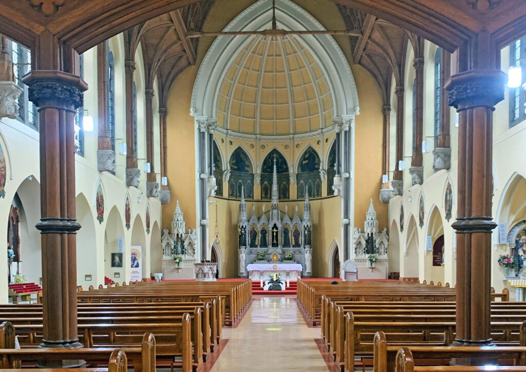 Graphic showing the inside of the Capuchin Friary, Church Street, Dublin 7 which shows the benches for the congregation, the altar and the statues.