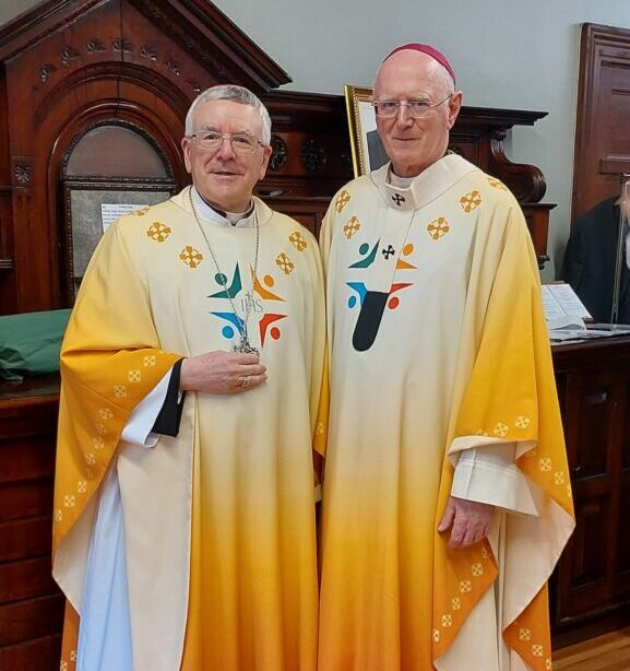 Archbishop Farrell’s words of welcome for Archbishop Luis Mariano Montemayor. The two are in yellow robes with Archbishop Farrell wearing a pink skullcap.